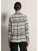 MADELEINE Elegantes Blusenshirt mit V-Ausschnitt in schwarz / wollweiß