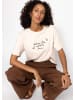 SASSYCLASSY T-Shirt mit LA DOLCE VITA Print in Beige
