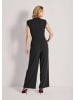 MADELEINE Eleganter Jumpsuit mit Stehkragen in schwarz