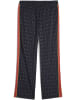 Puma Sporthose "ROAD TO UNITY AOP Relaxed Track Pants DK op" in Blau