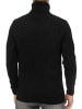 Rusty Neal Melierter Grobstrick Rollkragen-Pullover in Schwarz