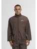 Sergio Tacchini Track Jackets in bracken/gardenia