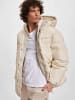 TOMMY JEANS Puffer Jacket in newsprint