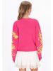 IZIA Cardigan in pink lime