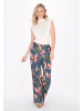 Usha Women Pants in dark green multicolor