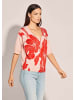 MADELEINE Feinstrickpullover mit Blütenprint in koralle / rosé
