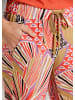 MADELEINE Farbige Schlupfhose mit grafischem Print in blutorange / multicolor