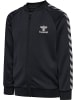 Hummel Trainingsjacke "Hmlnoma Zip Jacket" in Schwarz