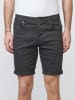 KOROSHI SHORTS MIT SPITZ ZULAUFENDER PASSFORM in schwarz