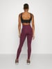 girlfriend collective Hosen High-rise in Plum