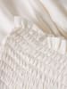 name it Rock in White Alyssum