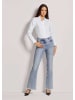 MADELEINE Moderne, ausgestellte Jeans mit Fransen in blue / denim