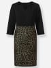 Heine Etuikleid in schwarz-oliv-bedruckt