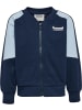 Hummel Kinder Trainingsjacke "Hmlmini Loose Block Zip Jacket" in Blau