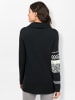 creation L Rollkragenpullover in schwarz-weiß-gemustert