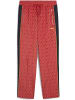 Puma Sporthose "ROAD TO UNITY AOP Relaxed Track Pants DK op" in Rot