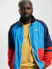 Nike Trainingsjacken in lt photo blue/university gold