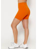 SASSYCLASSY Kurze Sportleggings in Orange