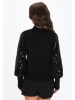 faina Women Sweater in black