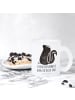Mr. & Mrs. Panda Teetasse Glas Stinktier Sitzen mit Spruch in Transparent