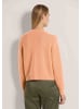 MADELEINE Kurze Sommerstrick-Jacke, V-Ausschnitt in pfirsich