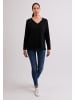 CASH-MERE.CH V-Ausschnitt Pullover mit Seitenschlitzen in Schwarz
