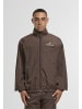 Sergio Tacchini Track Jackets in bracken/gardenia