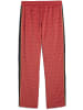 Puma Sporthose "ROAD TO UNITY AOP Relaxed Track Pants DK op" in Rot