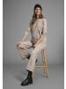 neun 9 monate Umstandspullover in beige meliert