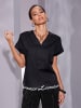 creation L Baumwollbluse in schwarz