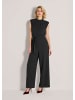 MADELEINE Eleganter Jumpsuit mit Stehkragen in schwarz