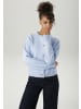 Strickjacke in hellblau-meliert
