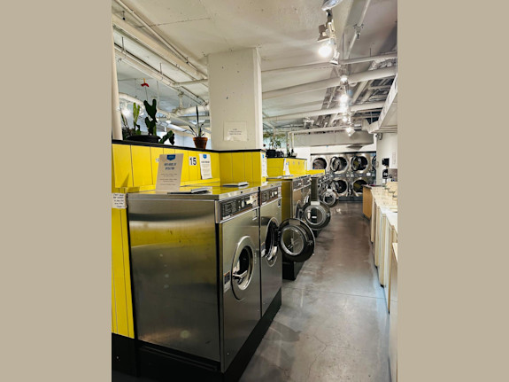 Laundromat with Property for sale.