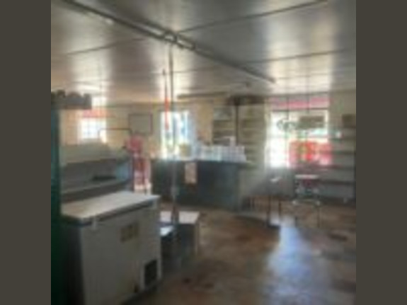 Shutdown Gas Station and House with Property