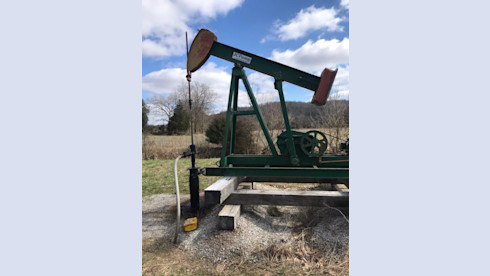 1100+ acres   with Eight Oil Wells