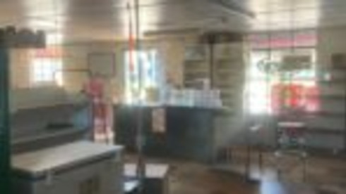 Shutdown Gas Station and House with Property