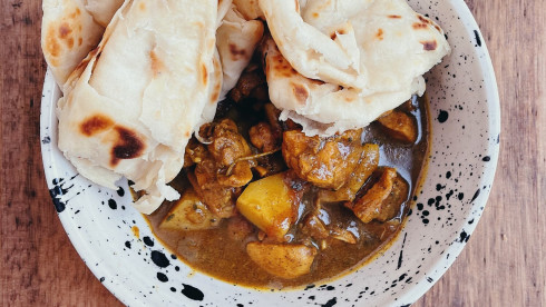 Caribbean Restaurant on Main Street of Busy City