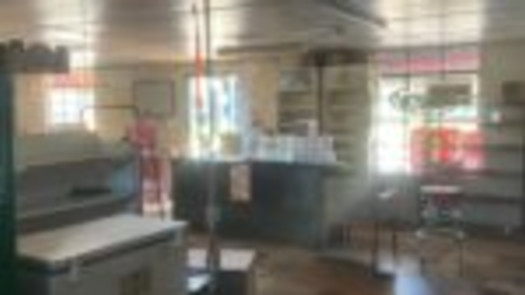 Shutdown Gas Station and House with Property