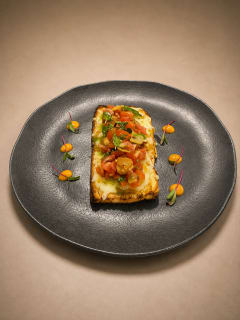 Brusqueta gratinada com mussarella