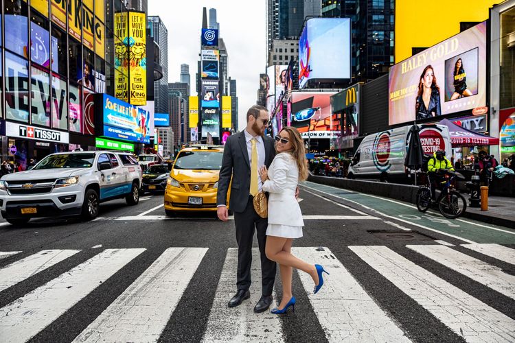 girl wearing manola blank blue shoes in times square 