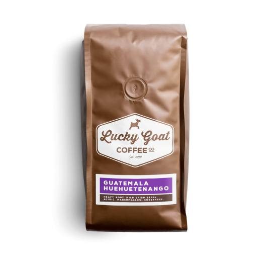 Bag of whole bean Guatemala Huehuetenango coffee, roasted by Lucky Goat Coffee Co.