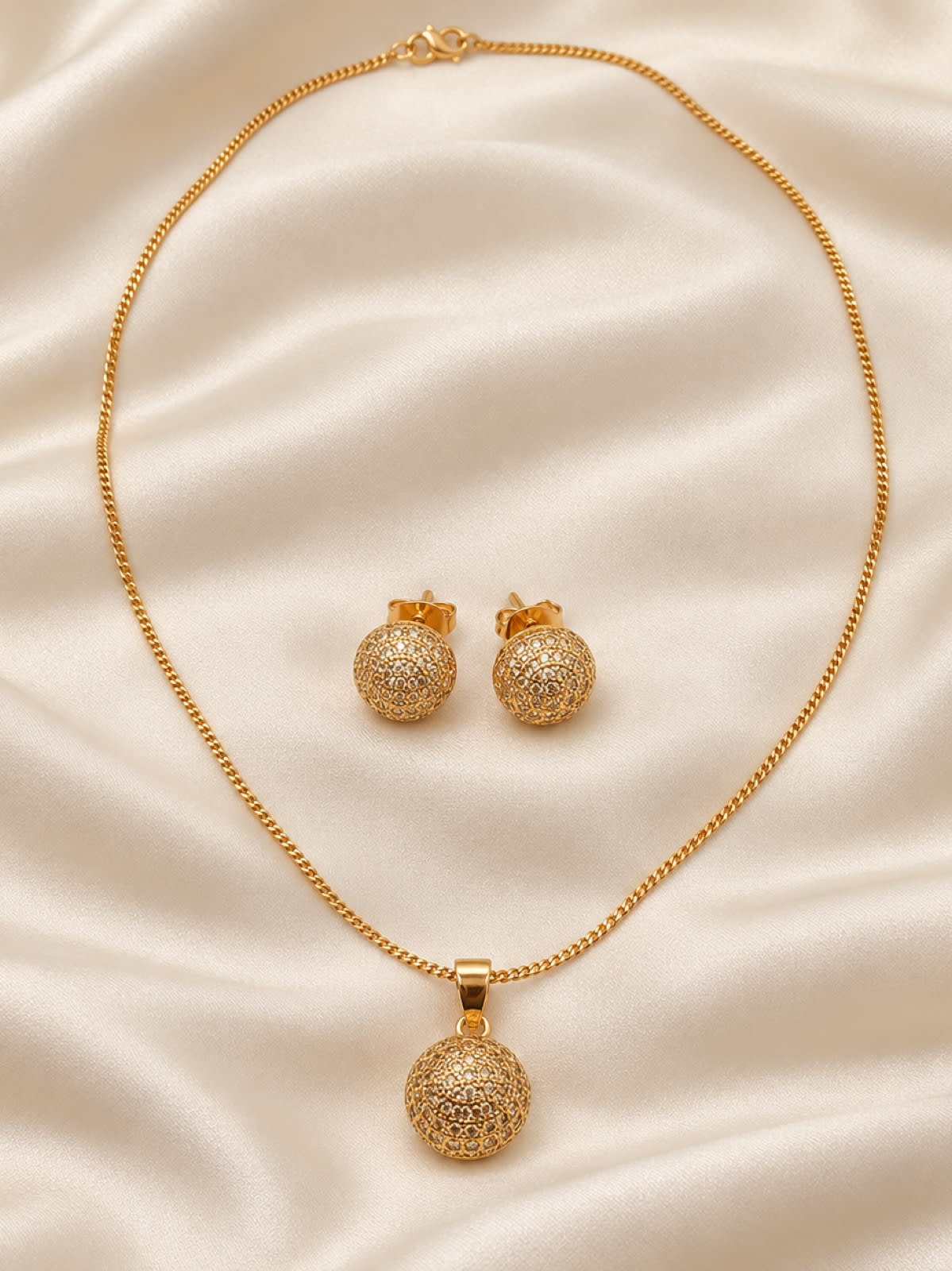 Golden Aura Sparkling Semi-Circle Pendant & Earrings Set