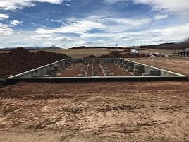 Steel pier foundation ready for home placement