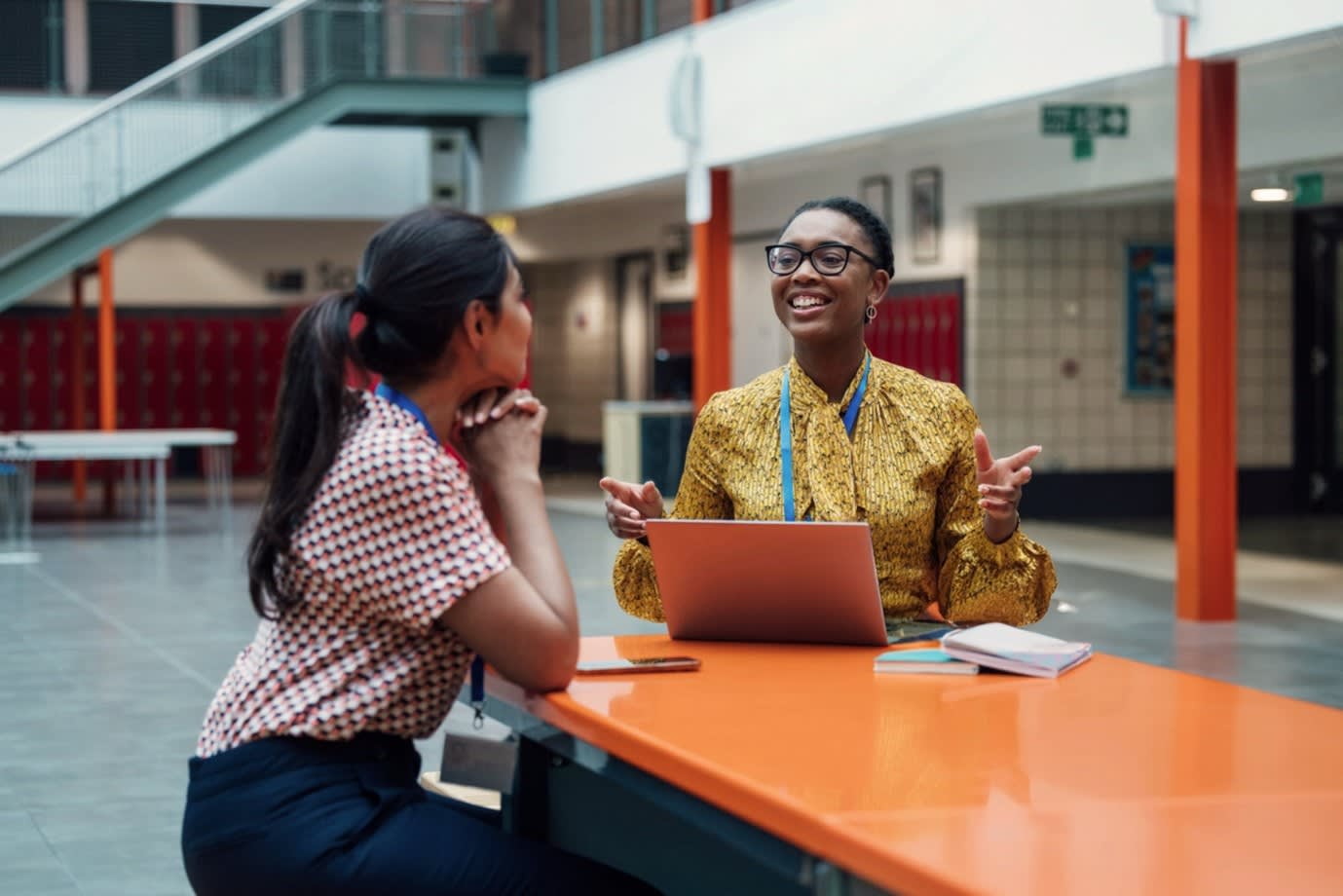 woman smiling in a school