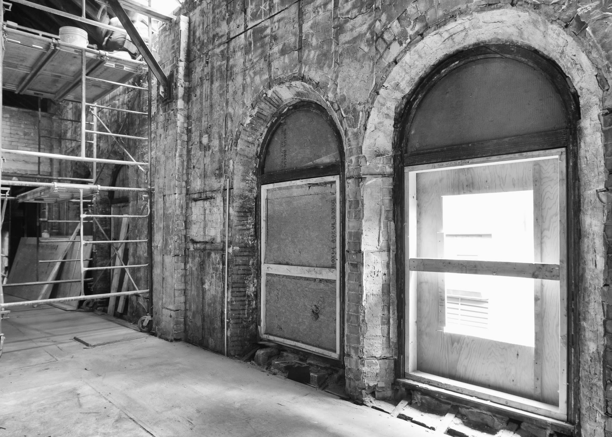 Wooden window frames also carefully restored and installed prior to the stained-glass additions.