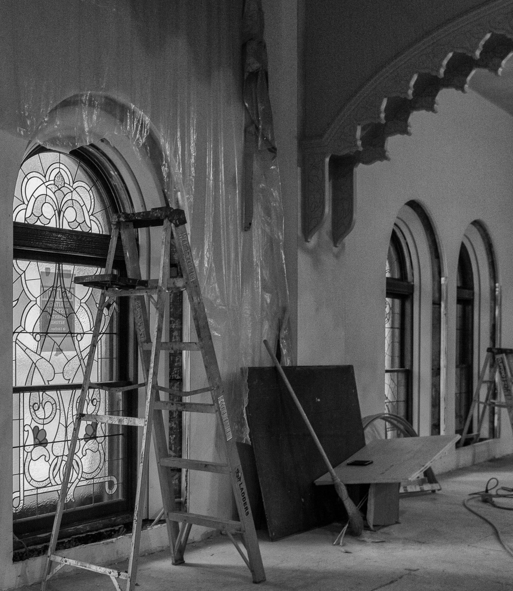 Restored window frame & stained-glass installed.