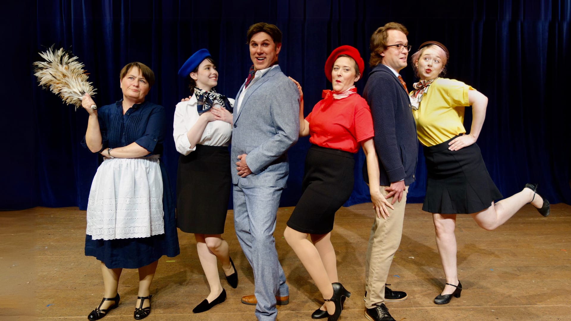 6 actors in jaunty poses