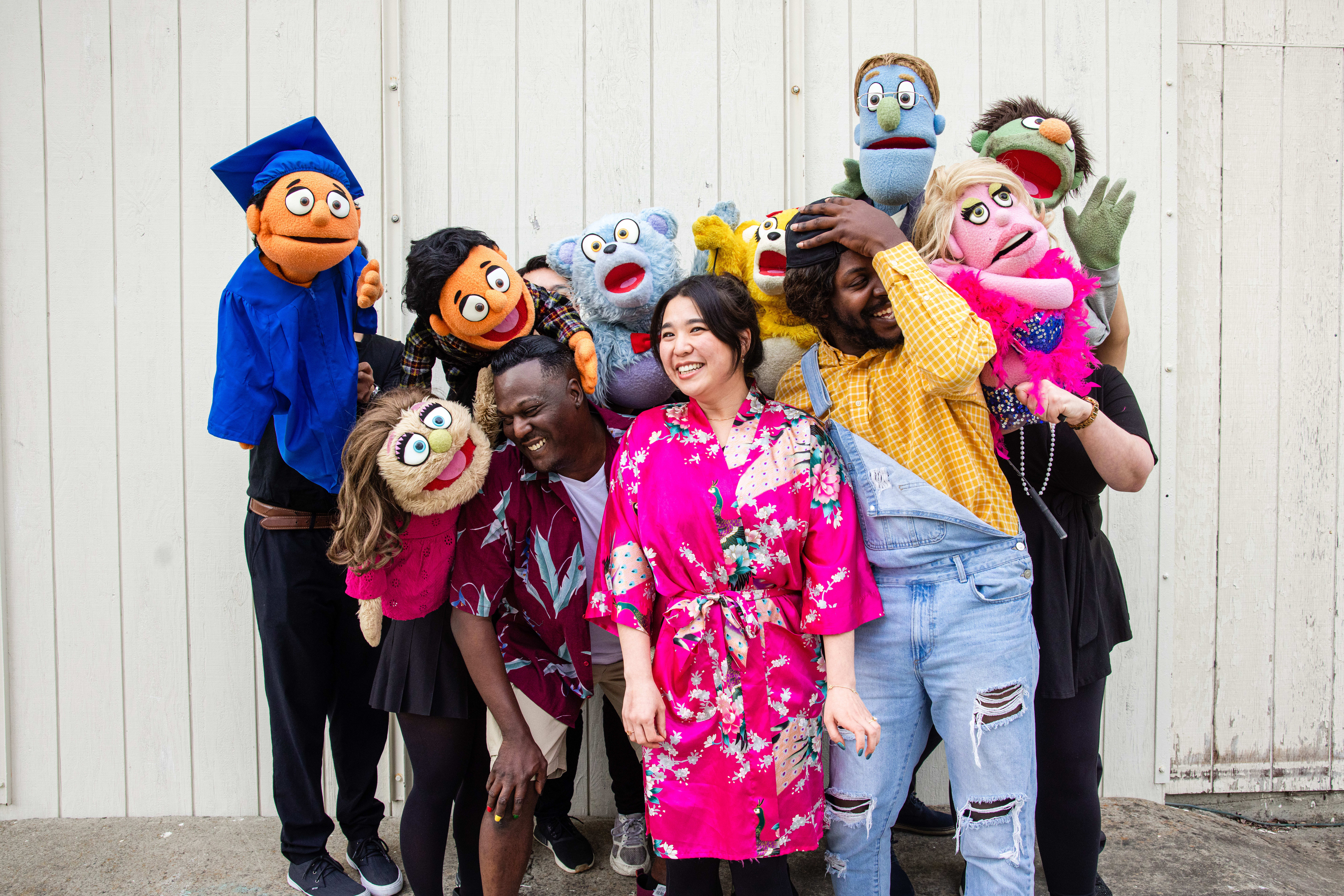 pupets and human characters of Avenue Q
