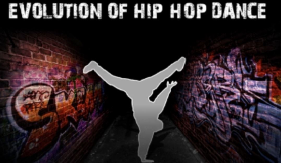 A young dancer spinning on his hand and upside down is  a signature expression of hip hop.