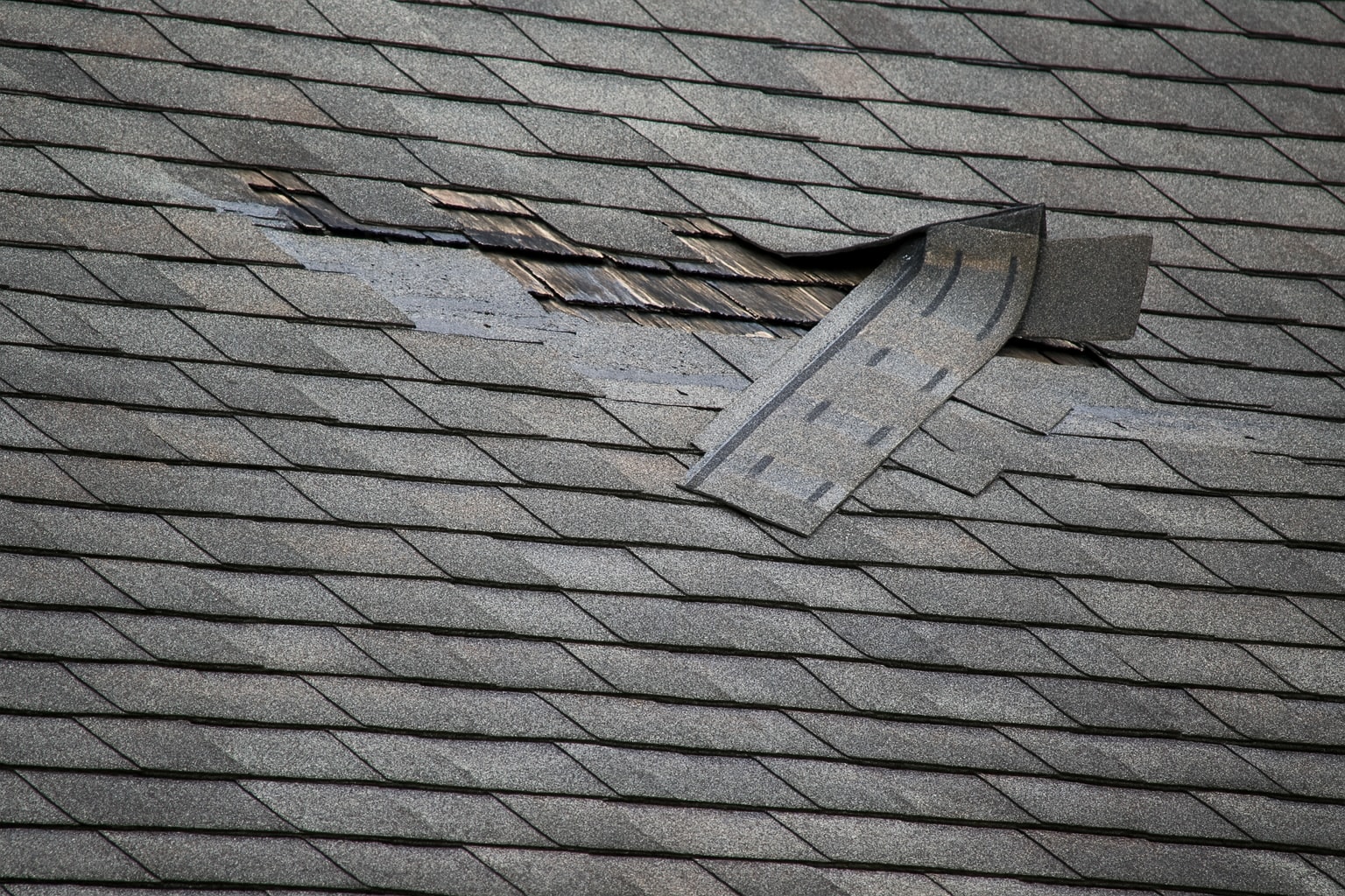 Missing shingles on a roof